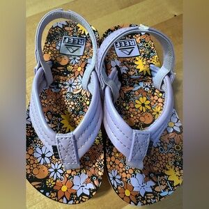 Reef Girls Sandals.  Excellent condition
Brand New without tags